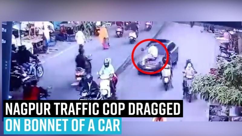 Nagpur traffic cop dragged bonnet of a car