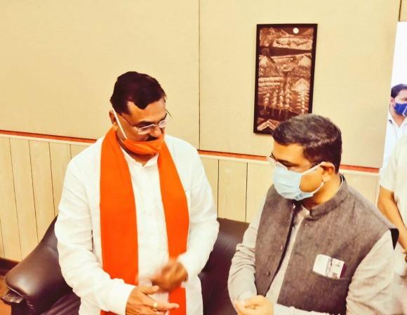 Madhya Pradesh minister Kamal Patel with Union Petroleum Minister Dharmendra Pradhan Kamal Patel