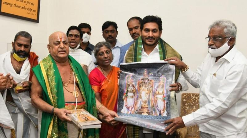 Andhra Pradesh CM YS Jagan Mohan reddy with vedic scholars and officials of Tirumala Tirupati Temple on January 1. Jagan Mohan Reddy