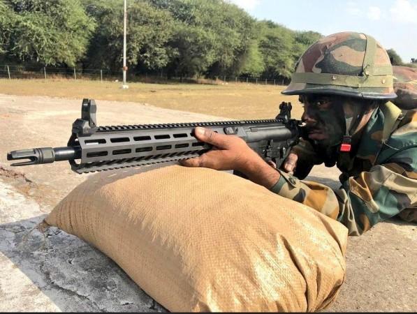 A Soldier of Indian Army at a firing range with SIG SAUER 716 SIG SAUER 716