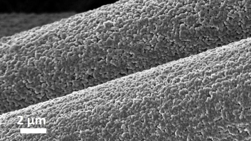 This magnified image shows aluminum deposited on carbon fibers in a battery electrode. The chemical bond makes the electrode thicker and its kinetics faster, resulting in a rechargeable battery that is safer, less expensive and more sustainable than lithium-ion batteries Aluminum