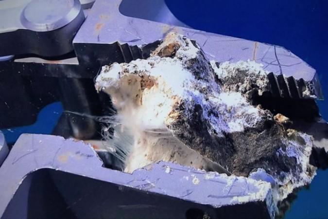 CSE researchers collected samples of carbonate rocks from the Del Mar East methane seep using a submersible watercraft. They discovered that deep-sea bacteria are dissolving these rocks, releasing excess carbon into the ocean and atmosphere. Carbon-releasing ocean bacteria
