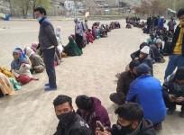 Locals waiting for their turn to purchase fresh vegetables, dates and other essential commodities at Kargil