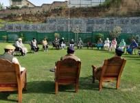 Cops counseling misguided juvelines, their parents during a session in Central Kashmir's Budgam district.
