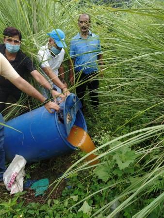 Sleuths of J&K Excise Department destroying illicit liquor Sleuths of J&K Excise Department destroying illicit liquor
