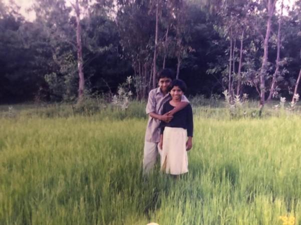 A younger Sneha and Harin on the farm A younger Sneha and Harin on the farm