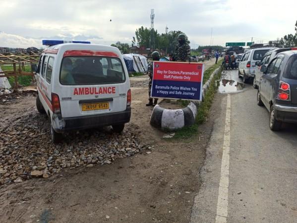 An ambulance plying on dedicated green lanes for health workers green land