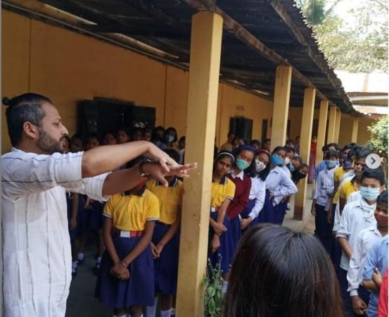 Nelson Deb at an awareness program in rural Assam highlighting the importance of good hygiene practices Nelson Deb at an awareness program in rural Assam highlighting the importance of good hygiene practices