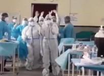 Health workers dancing in COVID wards