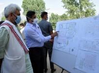 Lieutenant Governor, Manoj Sinha on Sunday inspecting work of 500-bedded dedicated COVID in Kashmir