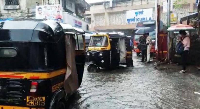 Mumbai heavy rains, flooding hit local transport Mumbai heavy rains, flooding