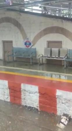 Sion station rain water on track. Sion station rain water on track.
