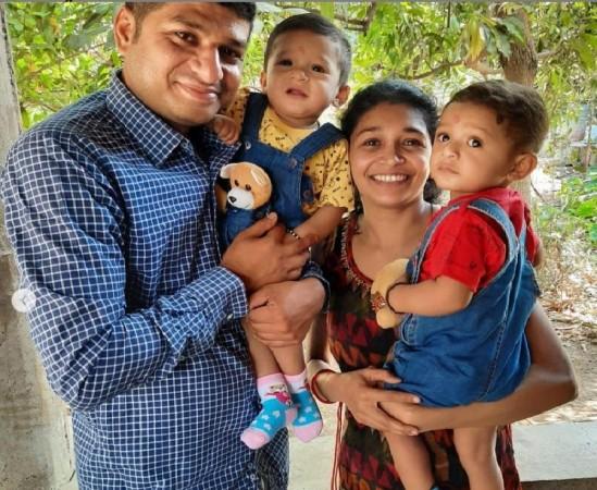 A Parsi couple celebrating first birthday of their twins A Parsi couple celebrating first birthday of their twins