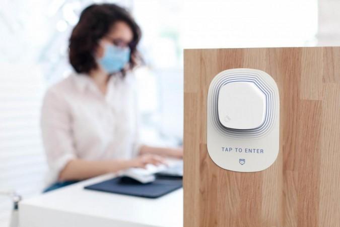 Concept image of the Soterius Scout biosensor, fixed to an office wall to detect minute fragments of COVID-19 COVID-19 sensor