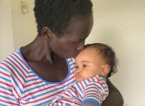Marathoner Aliphine Tuliamuk with baby Zoe