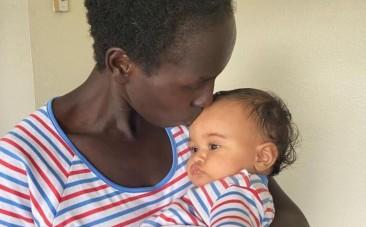 Marathoner Aliphine Tuliamuk with baby Zoe