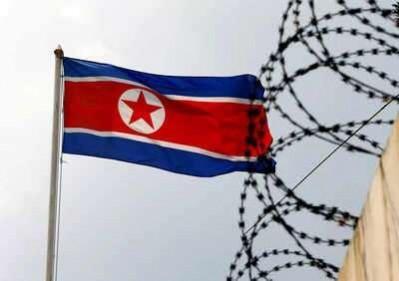 A North Korea flag flutters next to the concertina wire at the North Korean embassy in Kuala Lumpur, Malaysia. (Reuters) North Korea