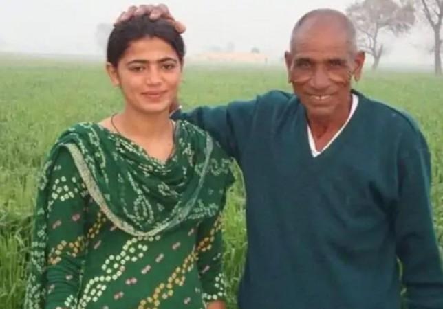 Savita Poonia with grandfather Ranjitram Poonia.