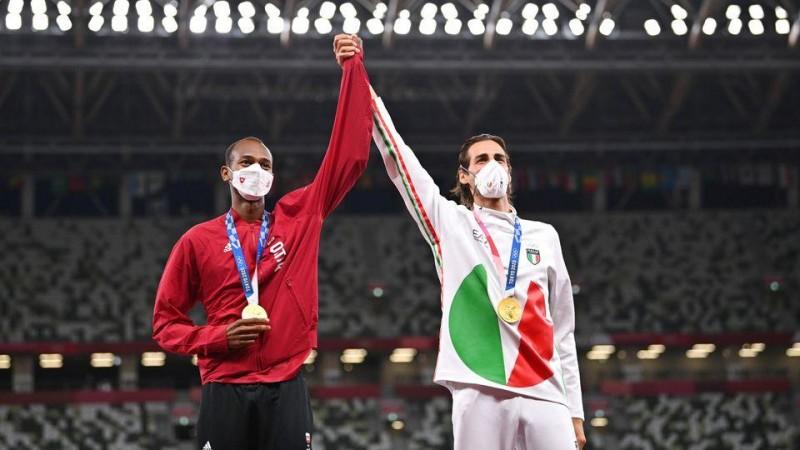 Qatar's Mutaz Essa Barshim and Italy's Gianmarco Tamberi sharing a golden moment Qatar's Mutaz Essa Barshim and Italy's Gianmarco Tamberi sharing a golden moment