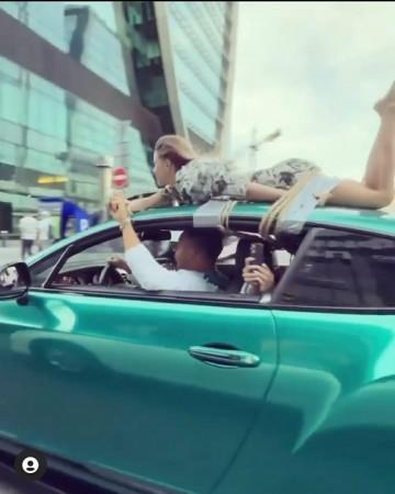 Russian 'influencer' drives with GF tied to car roof for 'trust test'