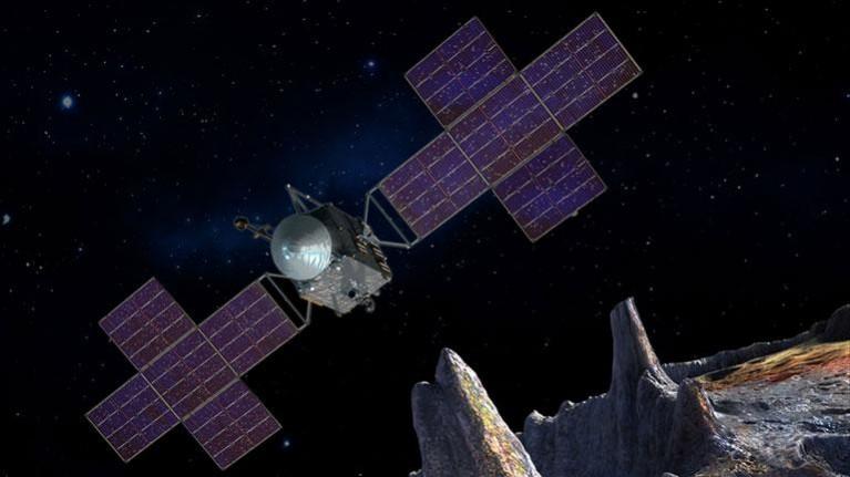 An artist's concept of the Psyche spacecraft, which will explore an asteroid thought to be the exposed nickel-iron core of an early planet. Psyche