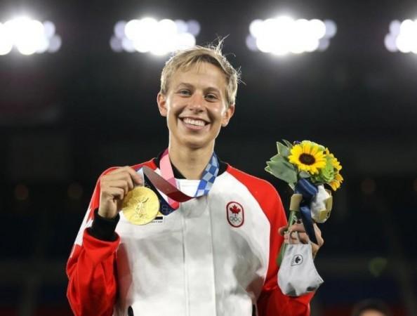 Canadian Footballer Quinn with Gold medal at the Olympics Footballer Quinn with Gold medal at the Olympics