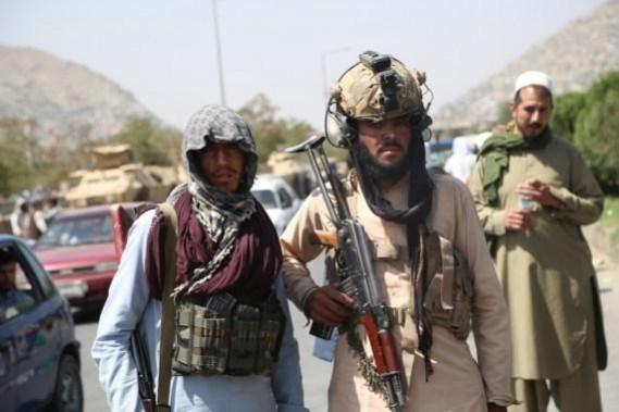 Afghan Taliban fighters stand guard in Kabul, capital of Afghanistan, Aug. 16, 2021. (Str/Xinhua/IANS) Afghan Taliban fighters