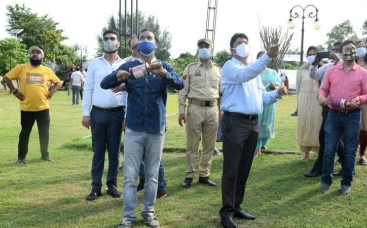 Divisional Commissioner Jammu Dr Raghav Langer flying kite during Kite Festival Divisional Commissioner Jammu Dr Raghav Langer flying kite during Kite Festival