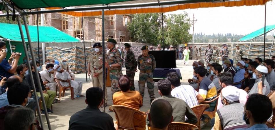 GOC 15 Corps and IGP Kashmir iteracting with families of active terrorists