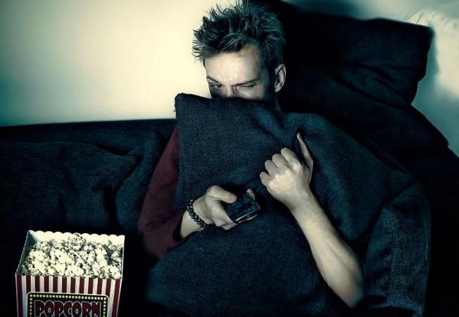 A man watching a horror movie (Representational Picture) Horror