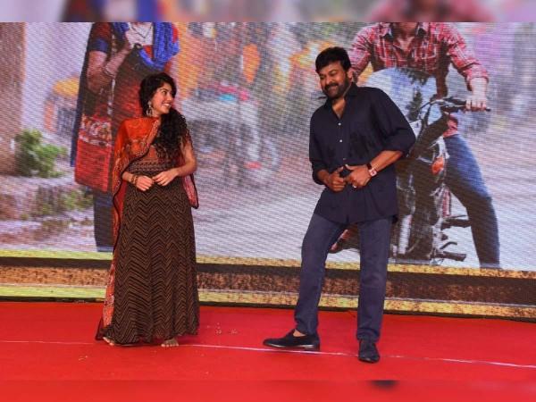 Sai Pallavi and Chiranjeevi dance on the stage during 'Love Story' pre-release event Sai Pallavi and Chiranjeevi dance on the stage during 'Love Story' pre-release event