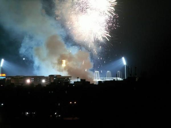 Crackers burst at a cricket stadium during a match Crackers burst at a cricket stadium during IPL season