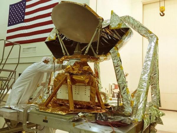 The COWVR instrument (center, wrapped in gold foil) in JPL's Environmental Test Laboratory during vibration testing. JPL