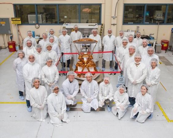 The COWVR development team and instrument in a clean room at JPL. JPL team