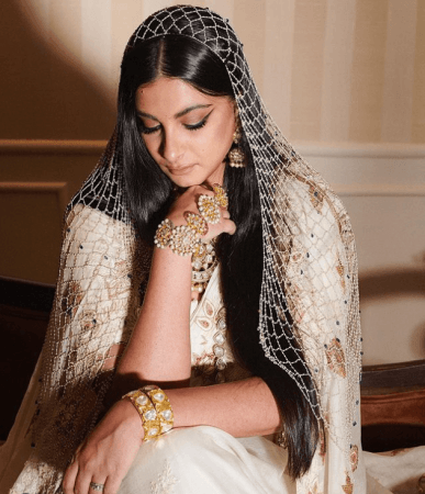 Rhea Kapoor flaunting her pearl veil and vintage jewelry on her wedding day Rhea Kapoor flaunting her pearl veil on her wedding day