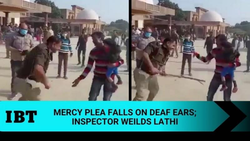 Kanpur cop thrashes man holding child in arms; suspended after video goes viral [details]