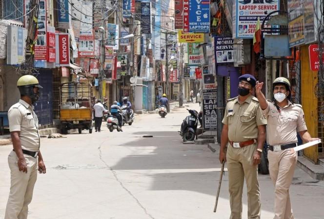File photo: Bengaluru Police security at SP Road, as non-essential commercial shops are not permitted to open as the Coronavirus lockdown was relaxed as part of the Karnataka Belagavi