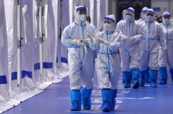 China puts up sprawling Covid camps with rows of cramped metal boxes