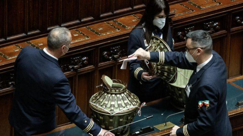 A lawmaker casts his ballot during the vote at the Chamber of deputies, in Rome, Italy, 26 January 2022.