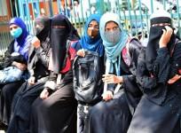 Muslim students wearing Hijab were stopped by policemen from entering Government PU College Yelahanka, amid Karnataka High Courts interim order restraining students from wearing religious symbols inside the classroom, in Bengaluru on Friday 18th February