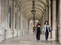 People wearing face masks walk in downtown Lisbon, Portugal(File photo)