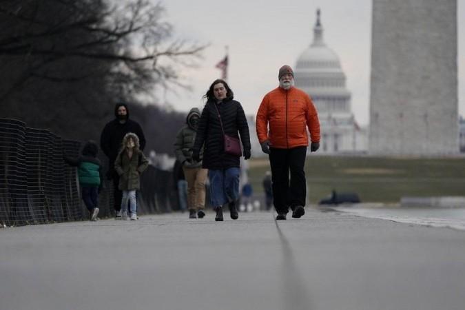 People visit the National Mall in Washington. People visit the National Mall in Washington.