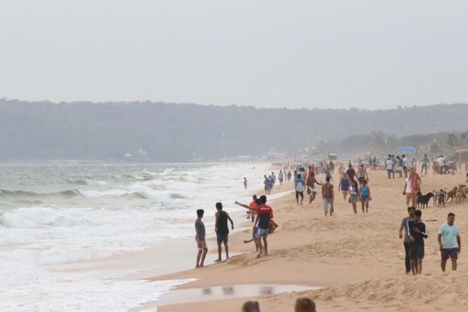 People seen enjoying themselves at Candolim Beach in Goa People seen enjoying themselves at Candolim Beach in Goa
