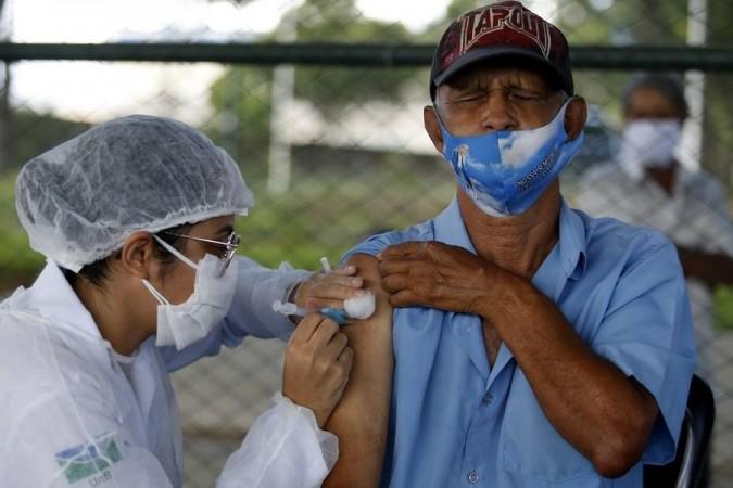 A man receives a dose of COVID-19 vaccine at Paulista Avenue in Sao Paulo, Brazil(File Photo) A man receives a dose of COVID-19 vaccine at Paulista Avenue in Sao Paulo, Brazil