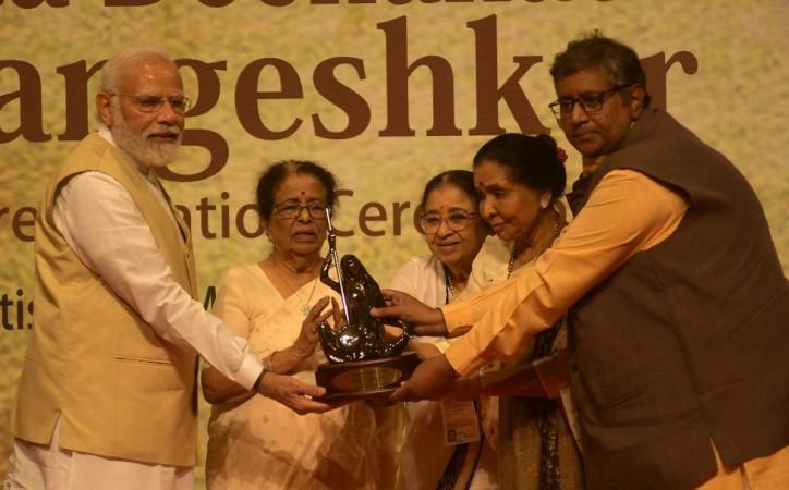 Prime Minister Narendra Modi was conferred with the 1st 'Lata Deenanath Mangeshkar Award' at a glittering function in Shanmukhananda Hall, here on Sunday evening.