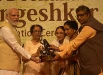 Prime Minister Narendra Modi was conferred with the 1st 'Lata Deenanath Mangeshkar Award' at a glittering function in Shanmukhananda Hall, here on Sunday evening.