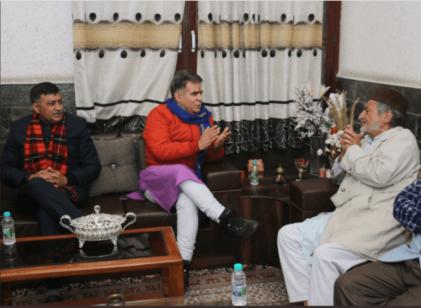 J&K BJP president Ravinder Raina with prominent Pahari leader Mushtaq Bukhari Pahari