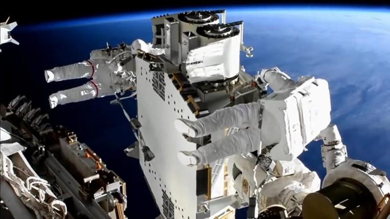 Spacewalkers Shane Kimbrough (foreground) and Thomas Pesquet work to prepare the second roll out solar array ready for installation an upcoming spacewalk.(*Credit: NASA)* Spacewalkers Shane Kimbrough (foreground) and Thomas Pesquet work to prepare the second roll out solar array ready for installation an upcoming spacewalk.(*Credit: NASA)*