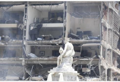Rescuers and firefighters work at the site where an explosion occurred at Hotel Saratoga in Havana, Cuba, on May 6, 2022. Rescuers and firefighters work at the site where an explosion occurred at Hotel Saratoga in Havana, Cuba, on May 6, 2022