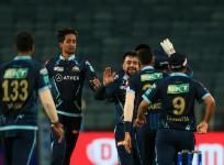 IPL 2022: Rashid Khan's 4/24, Gill's 63 not out help Gujarat Titans beat LSG, qualify for playoffs